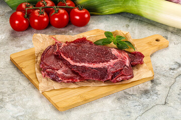 Raw beef cheeks cut for cooking