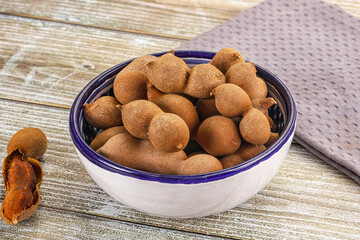 Tropical exotic Tamarind fruit heap