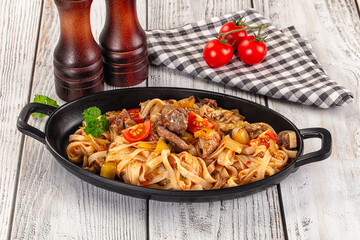 Asian udon noodles with beef