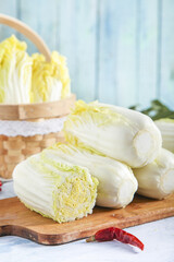 Fresh Chinese Cabbage on Wooden Cutting Board Ready for Cooking