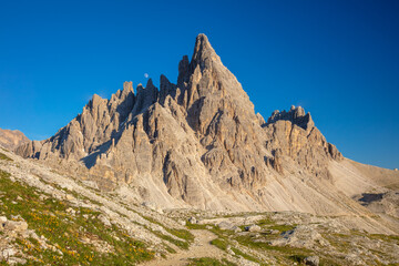 Rocky Mountain in the Dolomites and the Daytime Moon