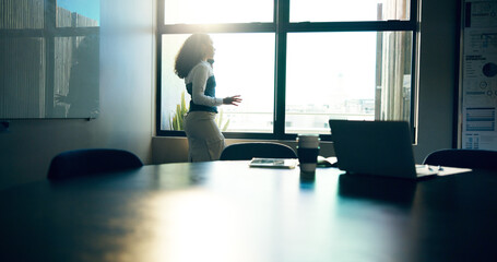 Business woman, phone call and talk in boardroom by window with networking at finance company. Person, communication and contact with conversation for proposal, deal or investment in office at agency