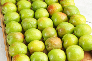 Fresh Green Xinjiang Pears in Wooden Crate - Premium Quality Fruit Display