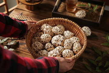 Dried Shiitake Mushrooms in Wicker Basket - Traditional Asian Cooking Ingredients and Herbal Medicine