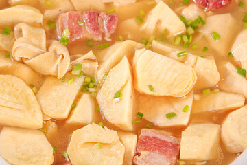Fresh Bamboo Shoots with Meat in Savory Broth - Traditional Asian Cooking with Alpine Vegetables