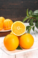 Fresh Navel Oranges on Cutting Board - Healthy Citrus Fruit Display
