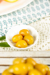 Sweet Glazed Chestnuts in Bowl - Traditional Alpine Dessert with Glossy Golden Coating