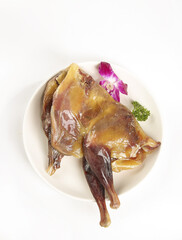 Hubei Style Marinated Air-Dried Whole Chicken Chinese Specialty Cuisine on White Plate