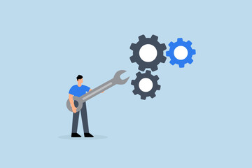 Adjustment and optimization for business improvement, entrepreneur grasping wrench to modify gear cogwheels configuration.
