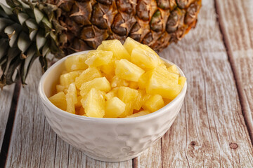 Sweet canned pineapple fruit pieces