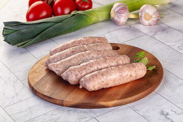 Raw pork sausages for grill