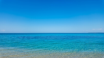 Possidi Cape Beach with Turquoise Sea and Blue Sky