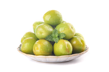 Fresh Green Plums on White Plate with Mint Garnish - Healthy Fruit Photography