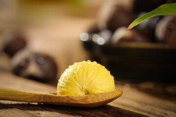 Raw Chestnut Kernel on Wooden Spoon - Fresh Healthy Nut Ingredient for Cooking