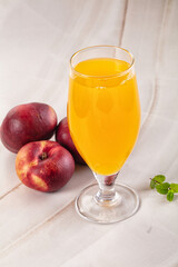 Vitamin beverage - peach juice glass