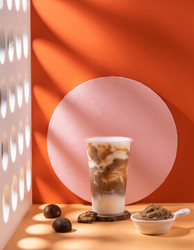 Chestnut pearl milk tea with espresso creative colorful background