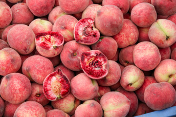 Fresh Blood Peaches from Hubei China with Red Flesh - Organic Stone Fruit Market Display