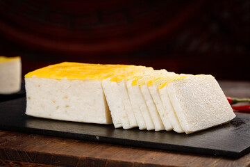 Jingzhou Fish Cake Chinese Specialty Gourmet Handmade Delicacy Sliced on Wooden Board