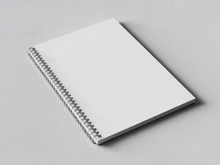 White Spiral Bound Notebook on a Light Gray Background blank empty
