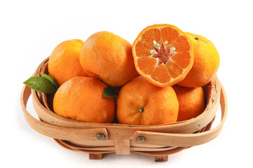 Fresh Gannan Seedless White Honey Oranges in Wicker Basket on White Background