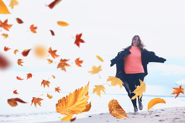 romantic girl in autumn style among falling leaves against a background of white sky