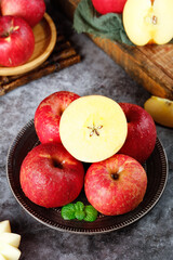 Fresh Red Apples from Daliangshan Yunnan with Frost Droplets and Mint Garnish