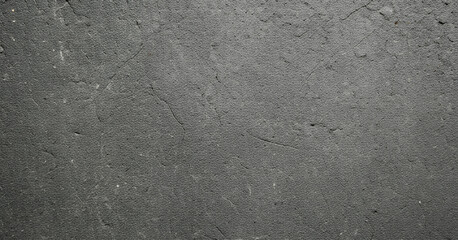 Fototapeta premium Gray textured surface featuring subtle patterns and gentle variations in tone, creating a refined abstract background with minimalist and natural elegance.