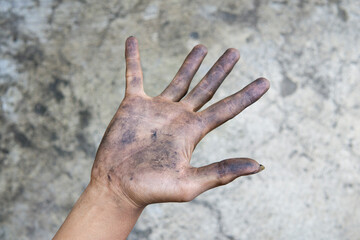 Close up of a man dirty hands