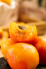 Fresh Ripe Apricot Halves on Wooden Surface - Healthy Organic Stone Fruit from Xinjiang