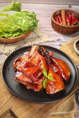 Marinated Soy Glazed Duck with Fresh Vegetables - Traditional Asian Specialty Cuisine on Wooden Table