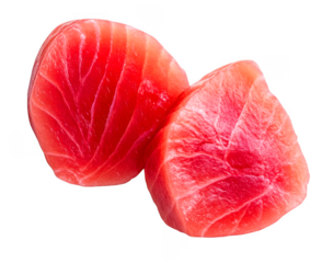Two cut raw tuna pieces present beautiful red colors on transparent background