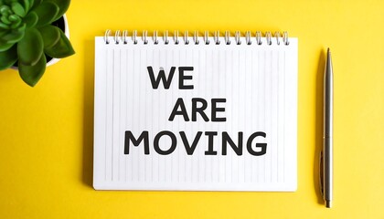 Moving Announcement on Notepad with Pen and Plant on Yellow Background.