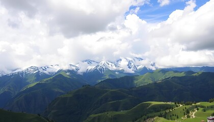 Cloudy sky over snow-capped peaks, terraced fields in a green mountain valley, mountainous, wildlife