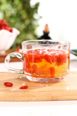 Ningxia Red Wolfberry Goji Berry Tea in Glass Mug - Traditional Chinese Health Drink with Superfood Benefits