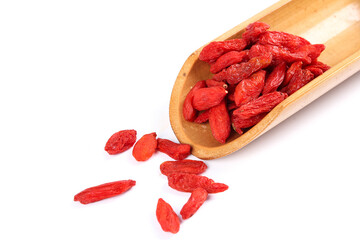 Dried Red Goji Berries in Wooden Scoop on White Background - Healthy Superfood Ingredient