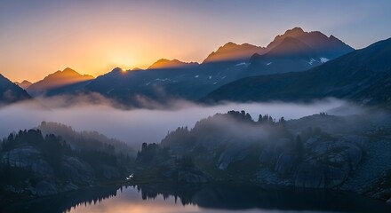 Sunrise over Misty Mountain Range and Lake.
