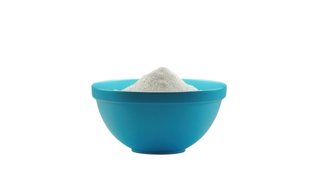A bright blue mixing bowl is filled with a generous pile of white powder.