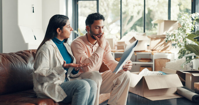 Couple, documents and stress with moving at new home with talk, loan or mortgage for property investing. People, man and woman at house, contract and frustrated with financial crisis for real estate - Powered by Adobe