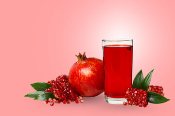 Pomegranate with a glass of rich red juice