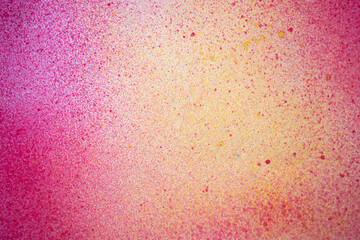 赤色と黄色のスプレー塗料で塗った背景