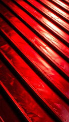 Obraz premium Vivid red corrugated metal surface with a glossy finish. The image displays parallel grooves creating a strong linear pattern. 