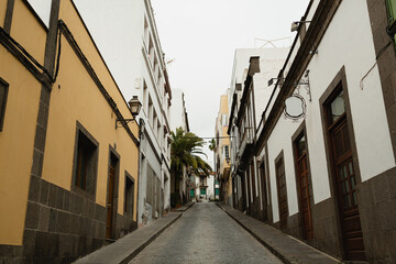 Narrow Pathway Surrounded by Colorful Houses