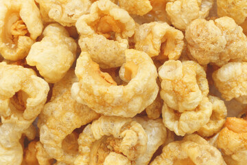 Pork rinds or Pork snack, deep fried pork skin crispy and blistered, Thailand food.