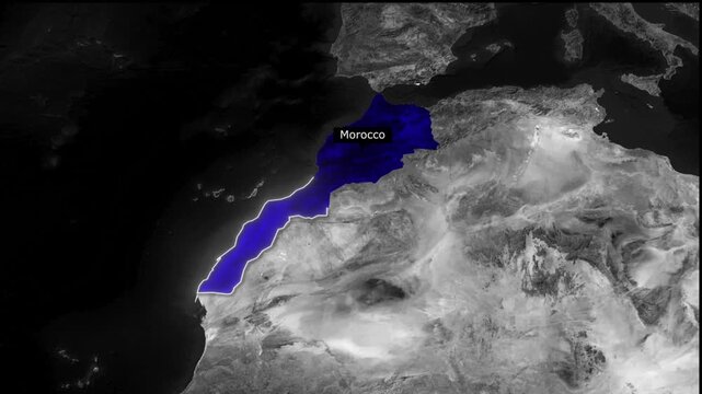 Aerial view of morocco highlighted in blue against a grayscale landscape and dark ocean background