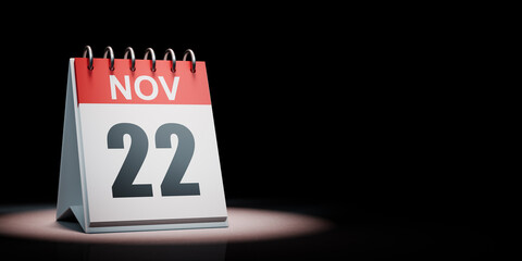 November 22 Calendar Spotlighted on Black Background