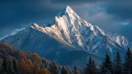Snowy mountain peak, dramatic sky