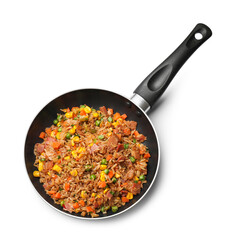 Delicious fried rice with vegetables and bacon in frying pan isolated on white, top view
