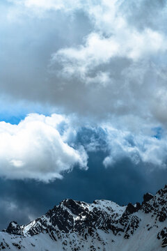 Clouds over a mountain range in the French Alps