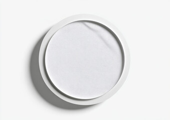 Round, white cosmetic container,  smooth surface,  subtle texture,  shadowed