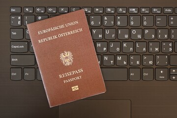 Austria Passport Lies Black Laptop